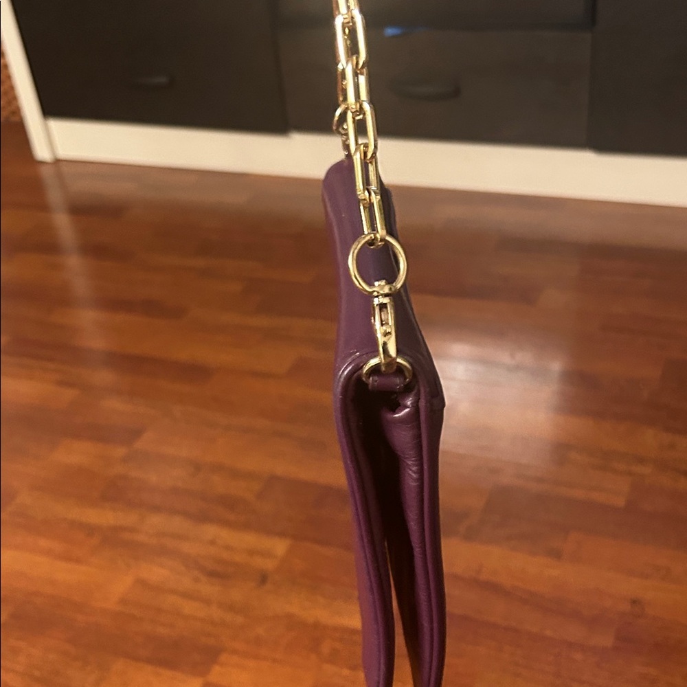 Tory Burch Plum/egg plant Leather Clutch with Gold Accents. - Picture 13 of 16